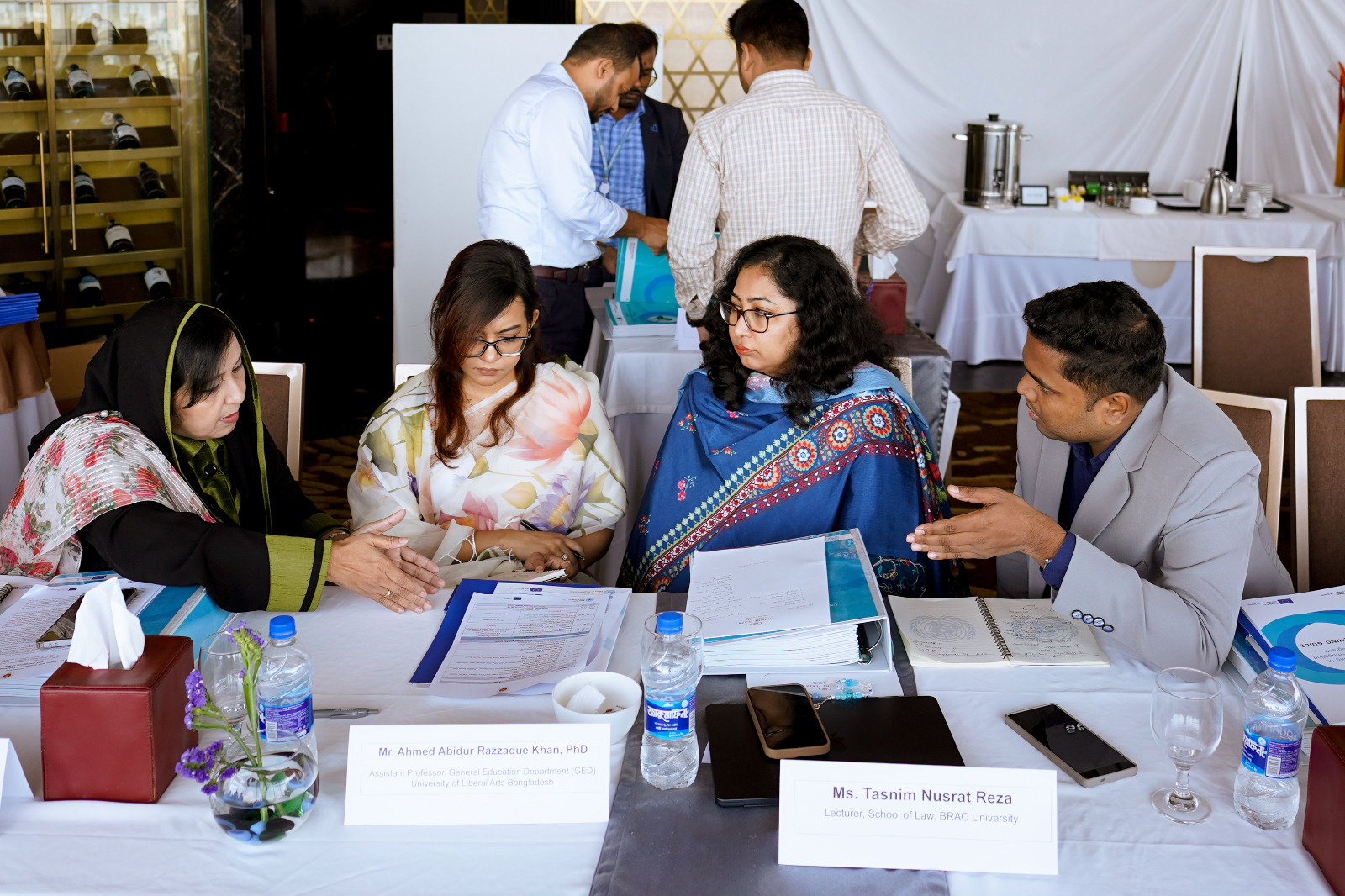 Participants discussing among themselves at the workshop