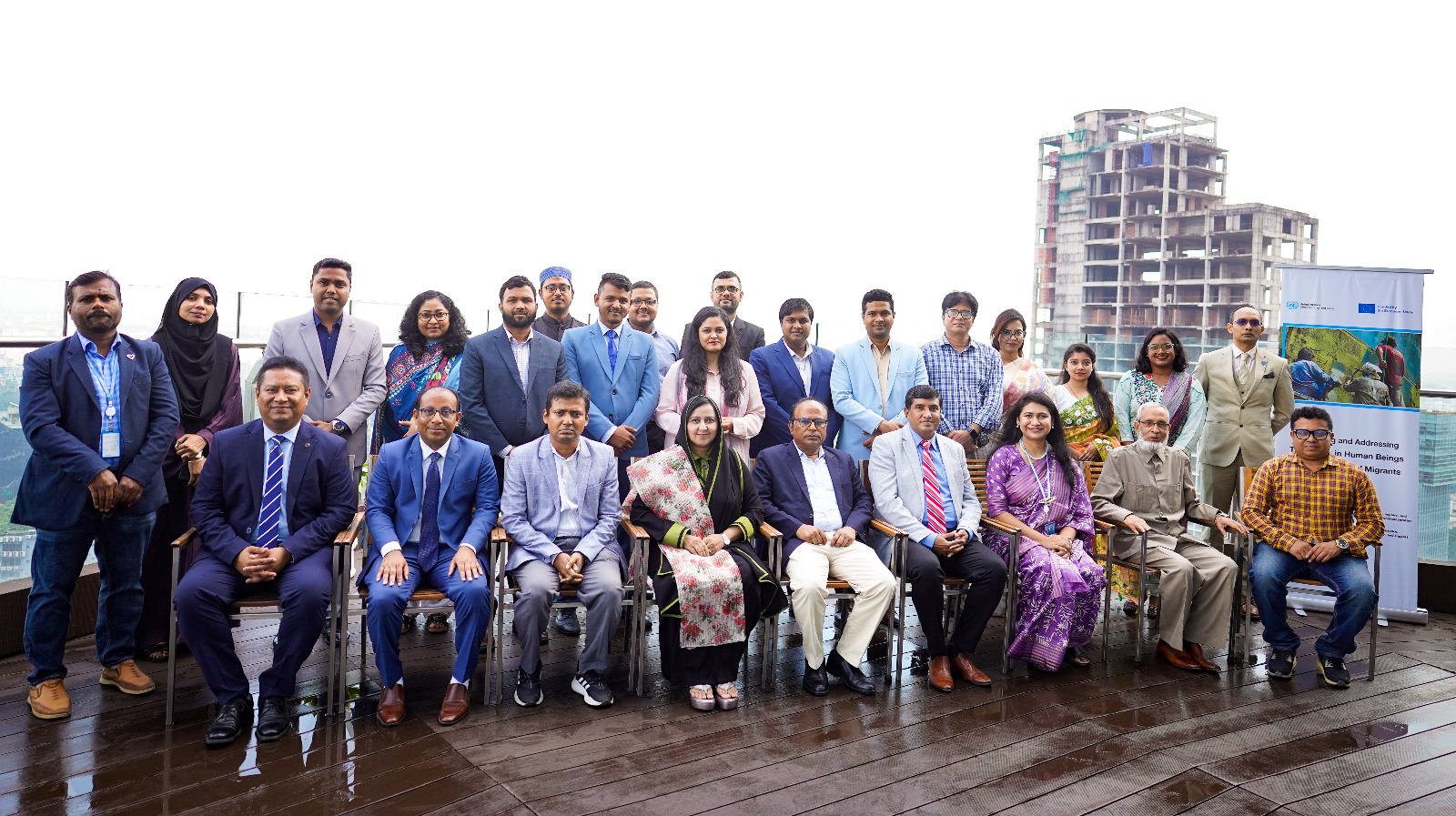 Participants seated together for a group photograph