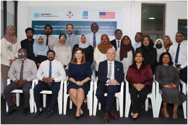 Participants posing for a group photograph. Participants posing for a group photograph.