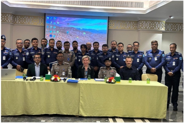 Participating police officials posing for a formal group photograph.