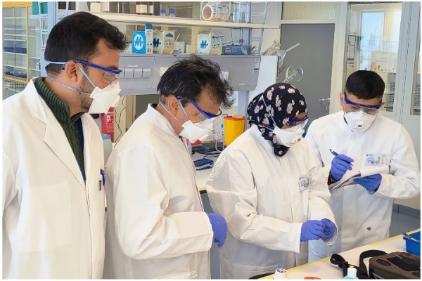 Participants at a laboratory conducting an exercise.